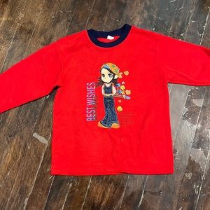 Red sweater with girl